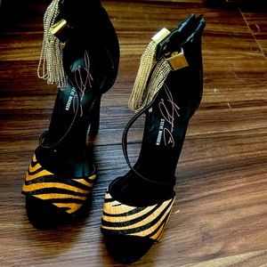 Steve Madden zebra with gold ankle tassel